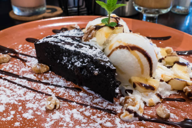 istock Chocolate brownie with ice cream 674184000