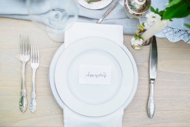 istock Table setting with dishes, cutlery and floristic, wedding decor 674187420