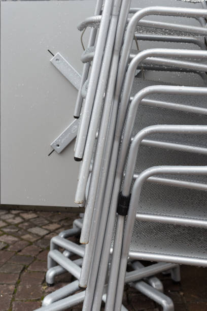 istock stackabel cafe chairs and table on a rainy day in south germany 674200746