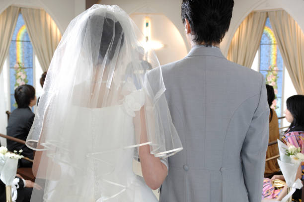 istock Rear view of the bride and groom 674200836