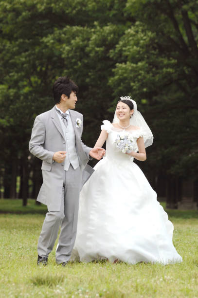 istock Bride and groom smile 674204762