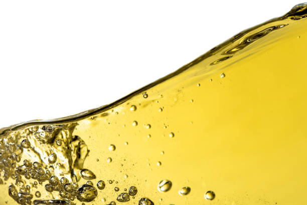 istock White wine splash background closeup, macro isolated on top, wave of wine, splashing, bubbles, texture, fizz. 674205082