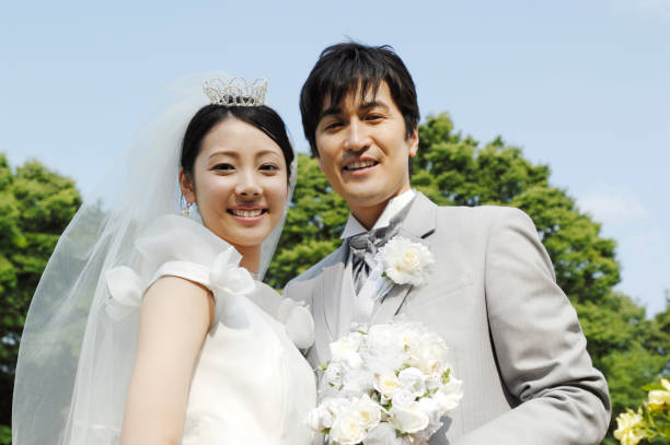 istock Blue sky and the bride and groom 674205314