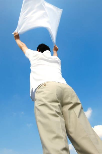 istock Woman hanging towels 674206326