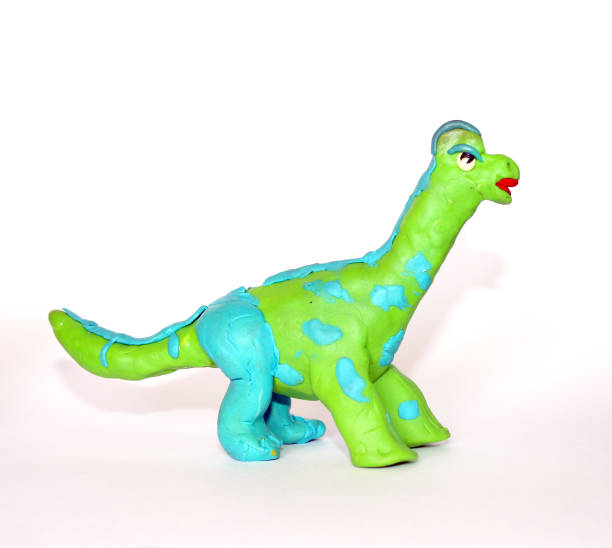 istock Plasticine  Dinosaur 3D sculpture on white background 674206648