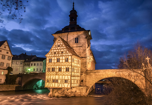 Famous Bamberg town hall with Regnitz river at night, Bavaria, Germany