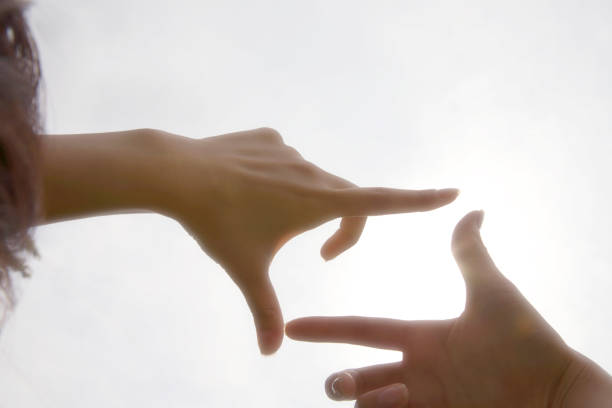istock Women make a frame with your fingers 674215078