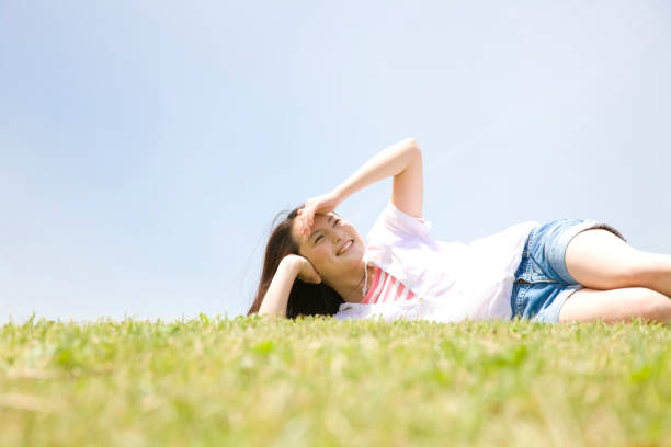 Women watching Sky slept on the lawn