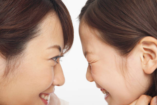 istock Mother and child to a staring contest 674220028