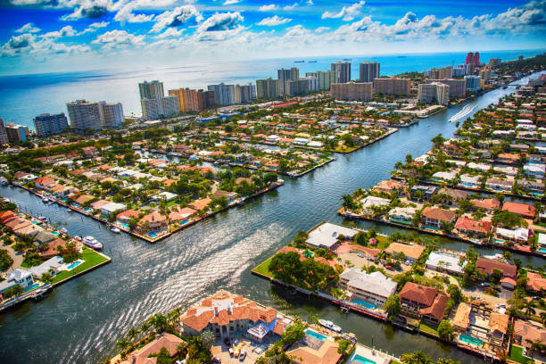 Pompano Beach and Fort Lauderdale Area From Above The Intracoastal Waterway as it bisects a residential neighborhood in the Pompano Beach area of South Florida just north of Fort Lauderdale. florida usa stock pictures, royalty-free photos & images