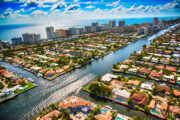 Pompano Beach and Fort Lauderdale Area From Above The Intracoastal Waterway as it bisects a residential neighborhood in the Pompano Beach area of South Florida just north of Fort Lauderdale. florida beach above stock pictures, royalty-free photos & images