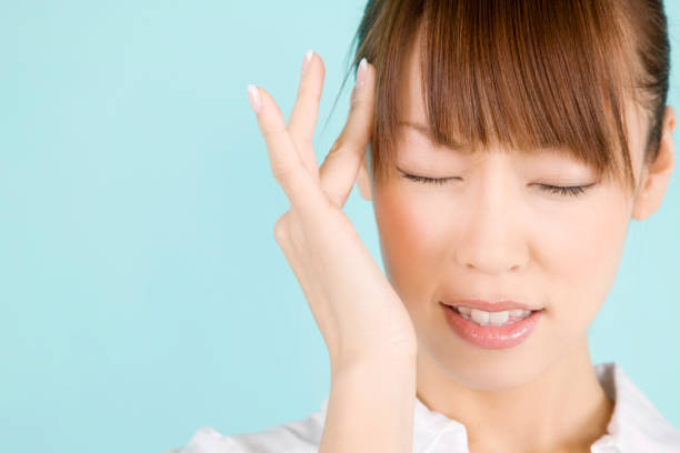 istock Women head pain 674222240
