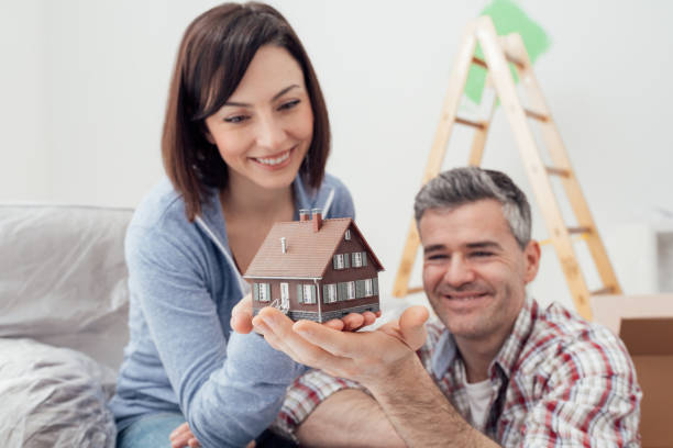 istock Couple building their house 674228060