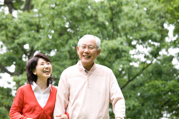 istock An elderly couple to walk in the Park 674228260