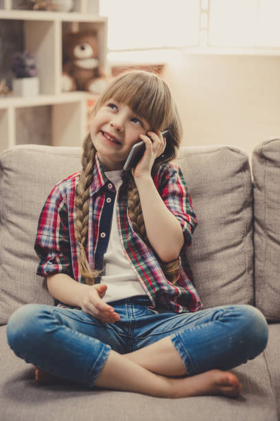 istock Little girl with gadget 674228270