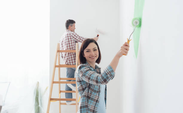 istock Couple painting together 674229262