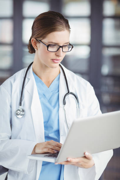 istock Female doctor working on laptop 674234308
