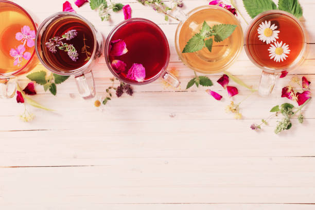 istock herbal tea on a white wooden background 674237500