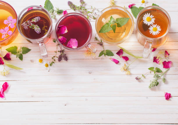 istock herbal tea on a white wooden background 674237510