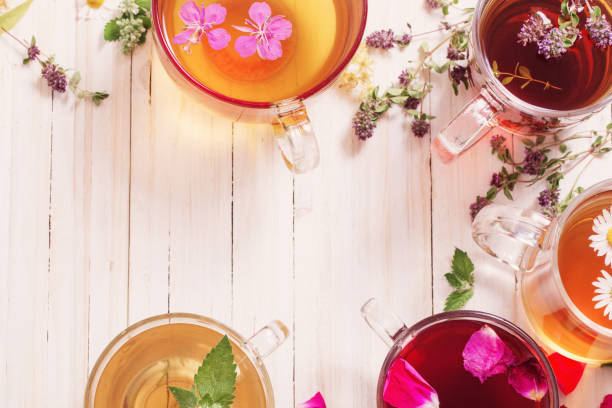 istock herbal tea on a white wooden background 674237518
