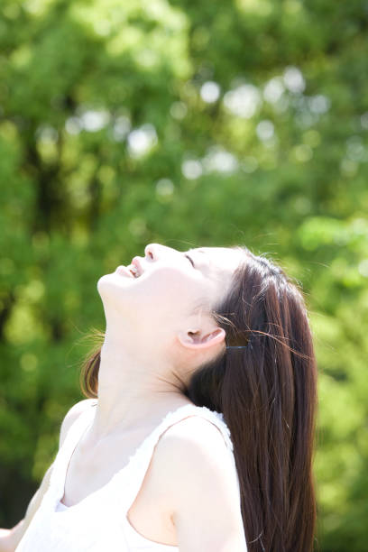 istock Women look up to the sky 674244178