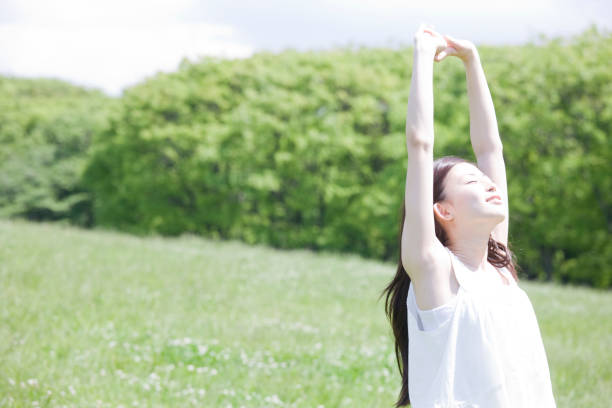 istock Women raise their hands 674244558