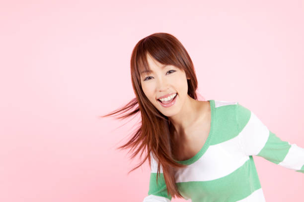 istock Women looked back with a smile 674244756