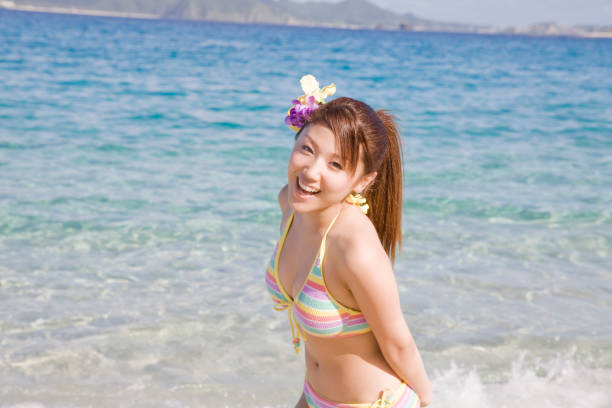 istock Walk the sandy bathing suits women 674249822