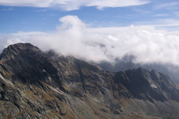 istock Clouds and views of High Tatras Mountains. 674251108