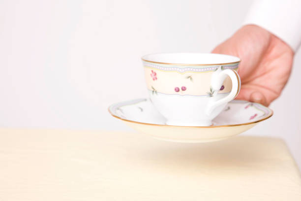 istock Clerk put on the coffee table Cafe 674257856