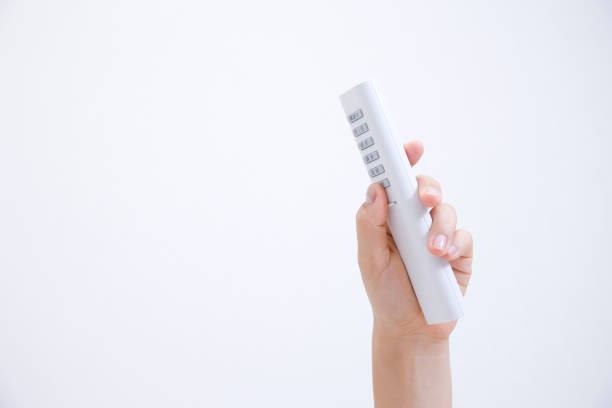 istock Turn off the room light women's hands 674266630