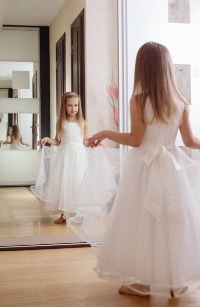 istock beautiful girl with mirror in the background 674266764