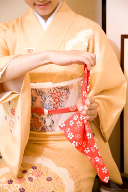istock Women folded silk gauze hand 674273554