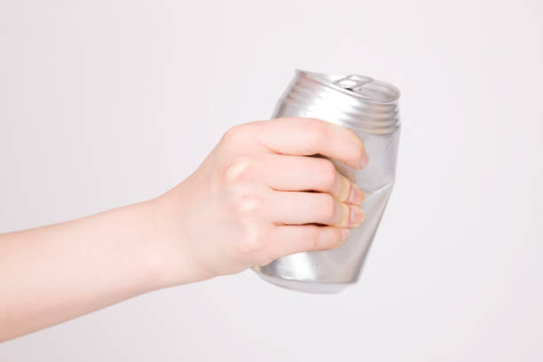 istock Women crush the cans in hand 674275512