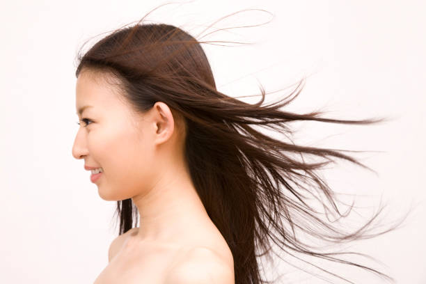 istock Women have hair is blowing in the wind 674277314