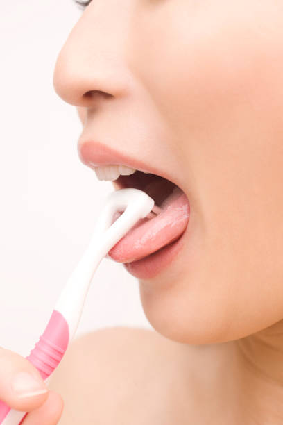 istock Ladies Polish tongue her mouth 674277792