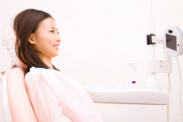istock Patients sit in the dental unit 674278602