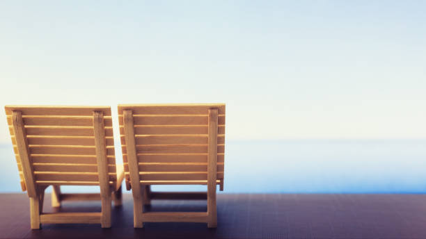 istock Sun loungers on balcony and sea view 674284736