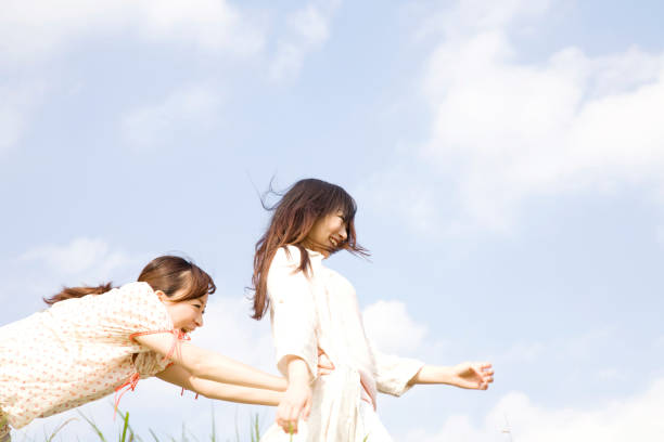 istock Women pushed back to a friend 674285070