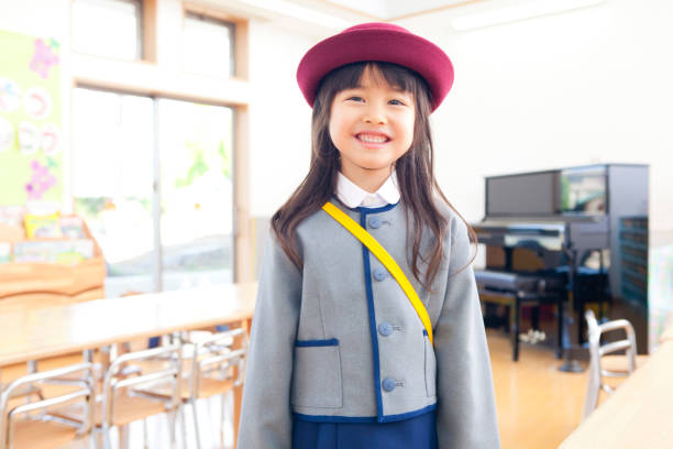 istock Kindergarten girls smile 674285728