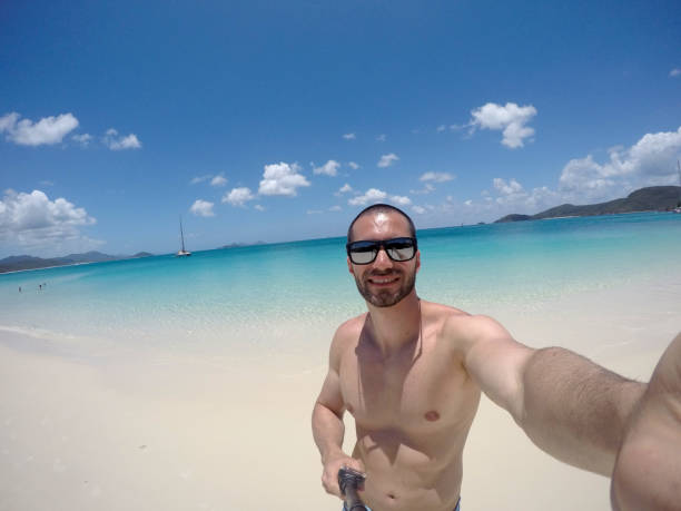 istock Man taking a selfie in Whitsunday, Australia 674286044