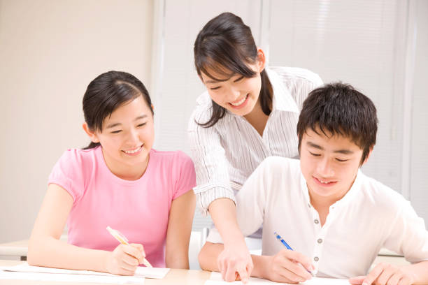 istock Men and women cram school teacher taught study 674286110