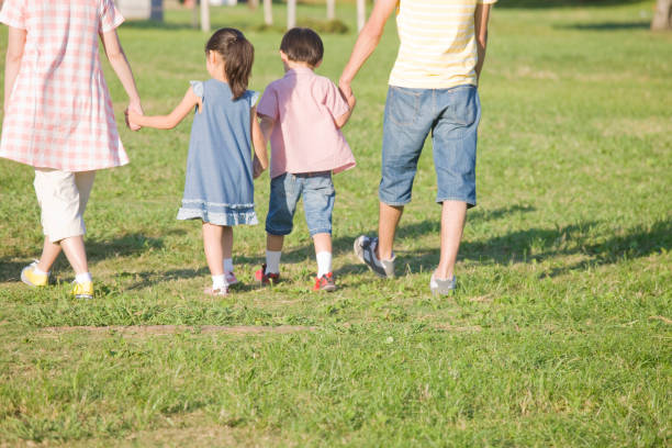 istock Family walk through the campground 674289298