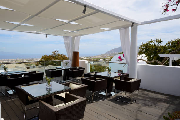 The terrace of outdoor restaurant, Santorini island, Greece stock photo