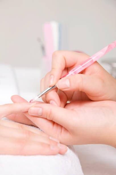 istock Nail the woman's hand 674295386