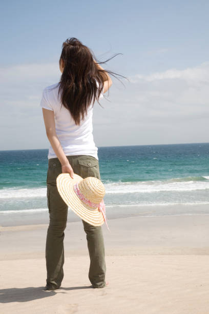 istock A woman at the beach 674297744
