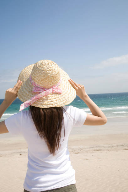 istock A woman at the beach 674297770
