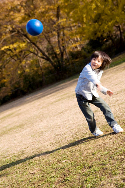 istock Children play with a ball 674307968