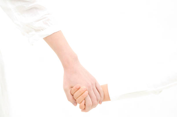 istock Mother holding hands with daughter 674308338