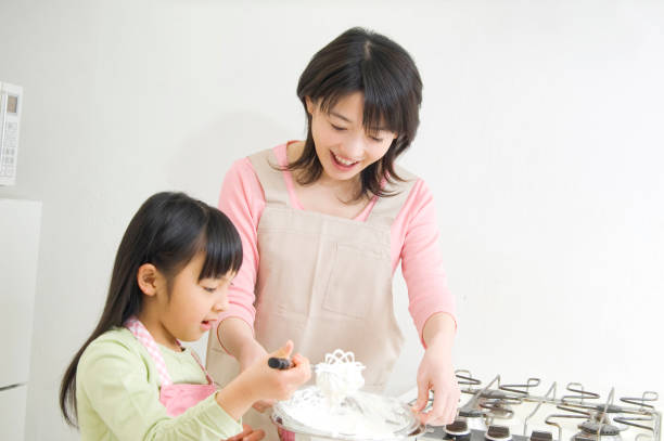 istock To cook mother and child 674308956